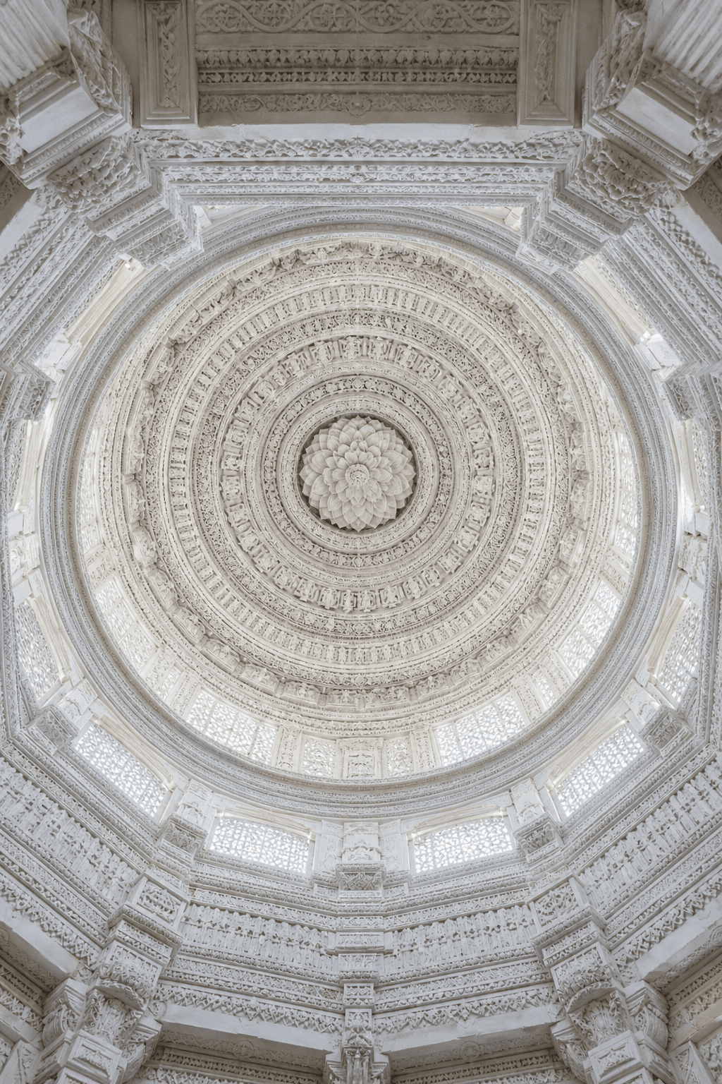 Carved white marble temple dome ceiling