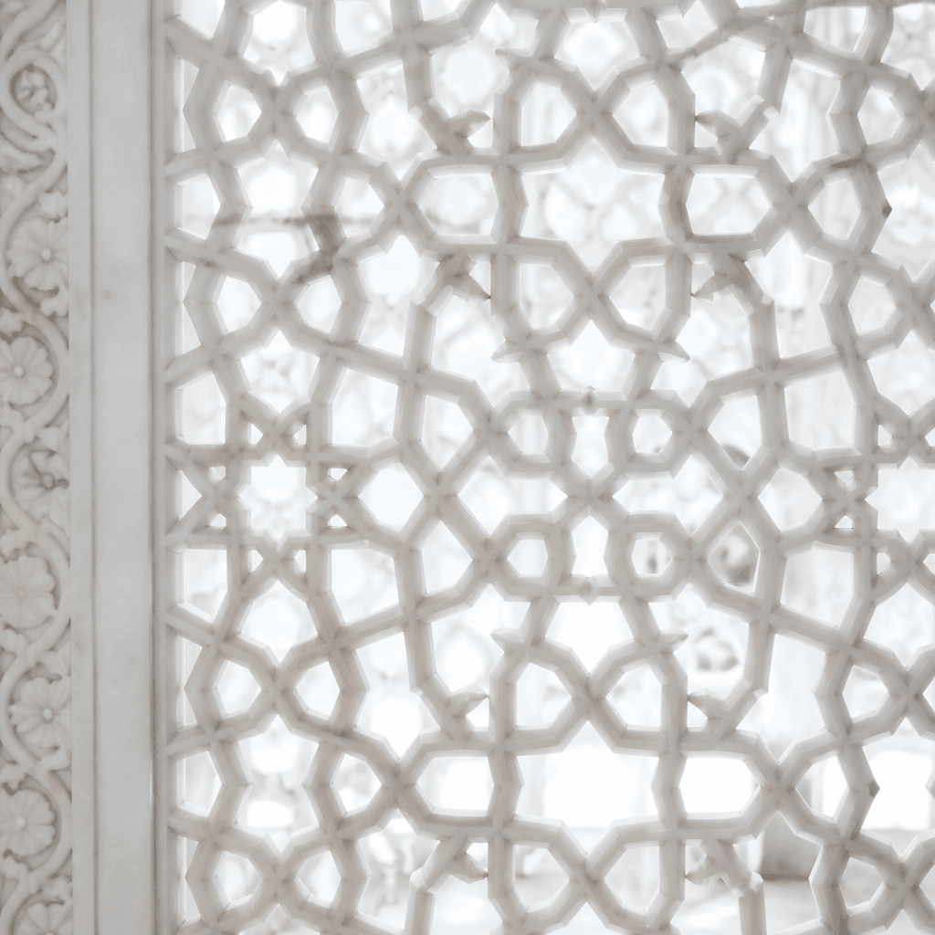 Sunlight through a carved marble jali screen